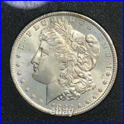 1882-CC GSA beautiful BU Carson City Morgan silver dollar. NGC MS64. #med004