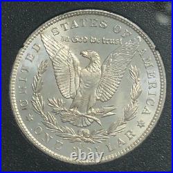 1882-CC GSA beautiful BU Carson City Morgan silver dollar. NGC MS64. #med004