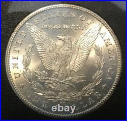 1884 CC Morgan Dollar GSA NGC MS65 GEM Beautiful White Coin Incl Box & COA