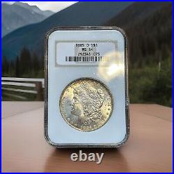 1885-O Morgan Silver Dollar NGC MS64 Beautiful Coin! Dual-Sided Rim Toning