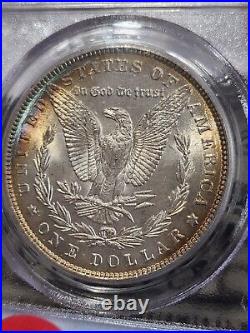 1887 Morgan NGC MS63 Rainbow Toning Obverse Beautiful Coin