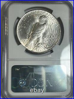 1935 Peace Dollar beautiful coin NGC solid ch bu +