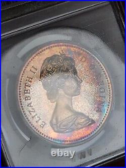 1972 Canada Voyageur Silver Proof Dollar NGC SP66 Beautifully Toned Rainbow